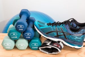 dumbbells and sneaker for physical therapy