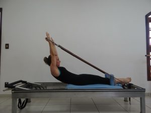 woman using pilates for physical therapy